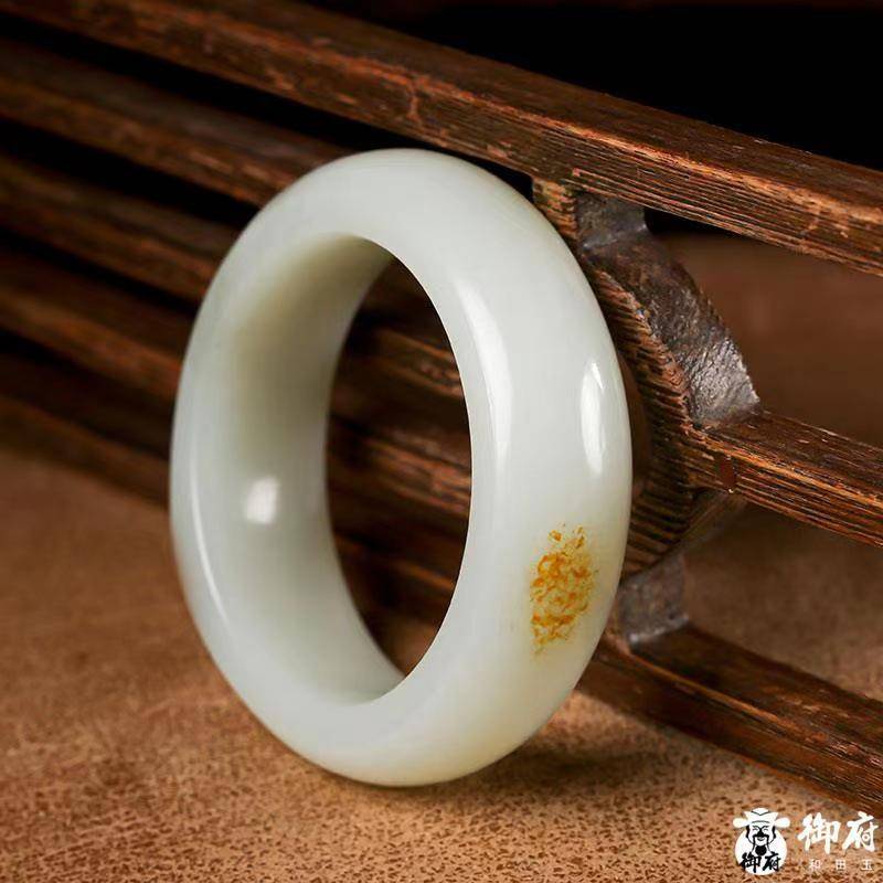 Close view of a polished Hetian jade bangle